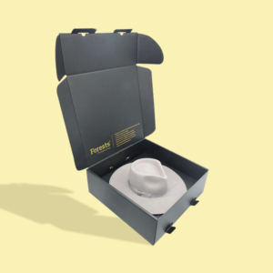 White Hat placed inside a Black Mailer Box, placed open